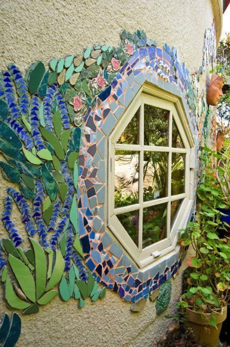 A French chalet feel surrounds this cozy hexagonal mosaic art window