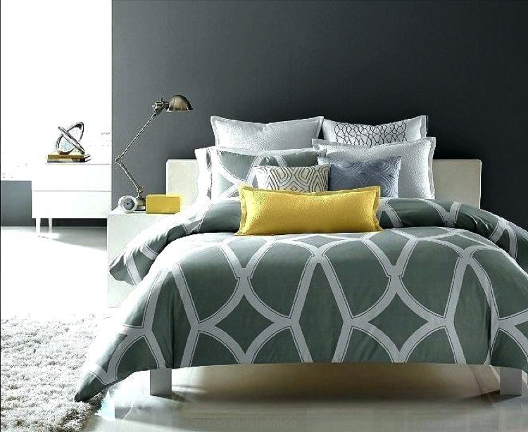 Adding a light splash of color with decorative bed pillows would make your room stand out.