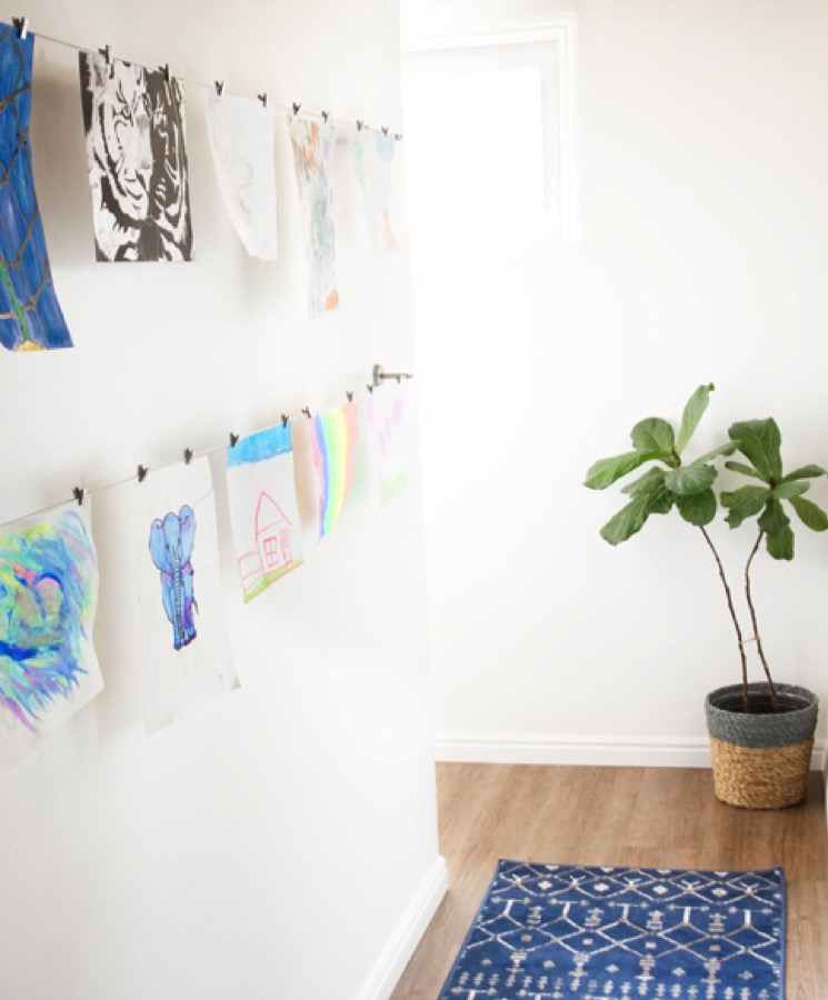 Artwork of kids' drawings can be displayed as wall art.