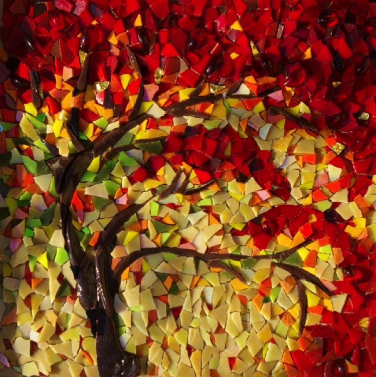 Generously laid glass pieces combine Fall inspired handmade mosaic design with a stunning array of changing colors.
