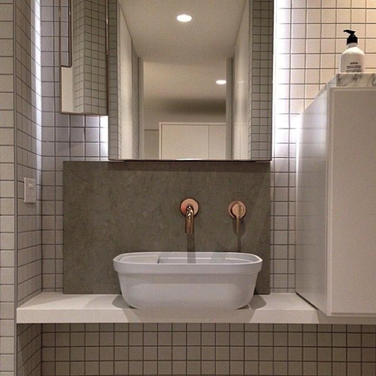 Bathroom tile with stonework bathroom backsplash