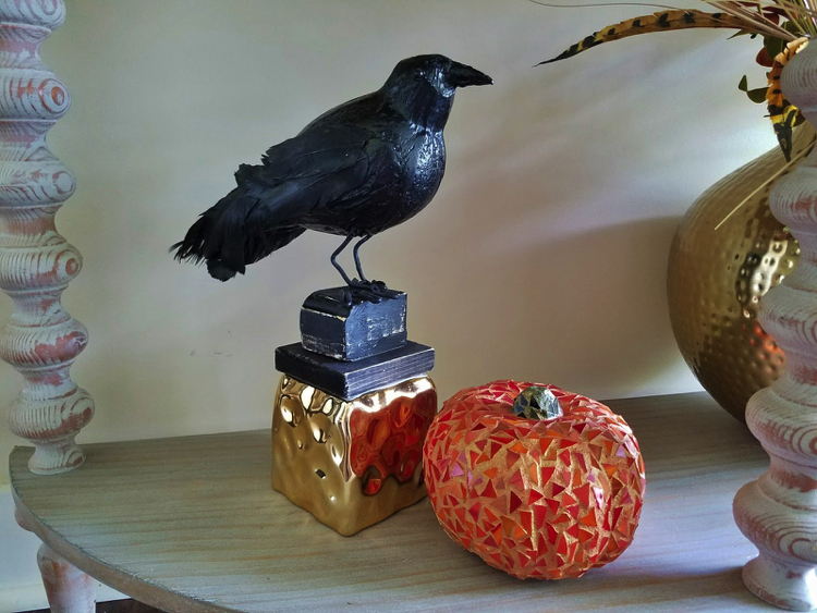Halloween Mosaic Design of a crow watching over a pumpkin mosaic design