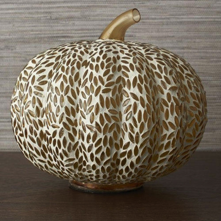 A subtle Halloween décor of a gold glass pumpkin mosaic design