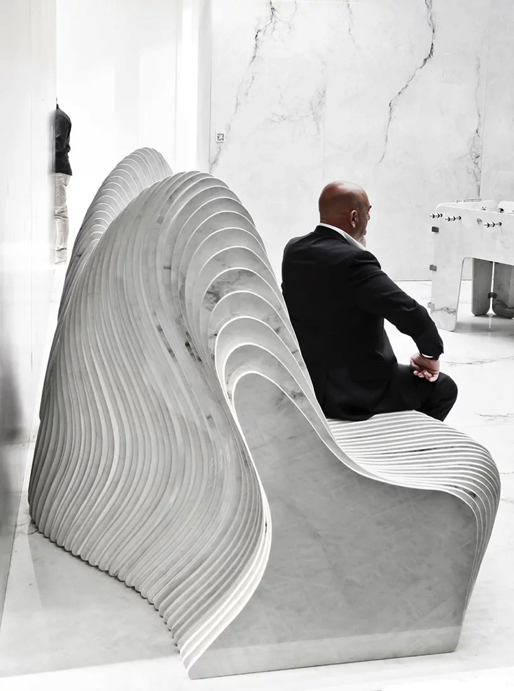 A stunning couch made of marble.