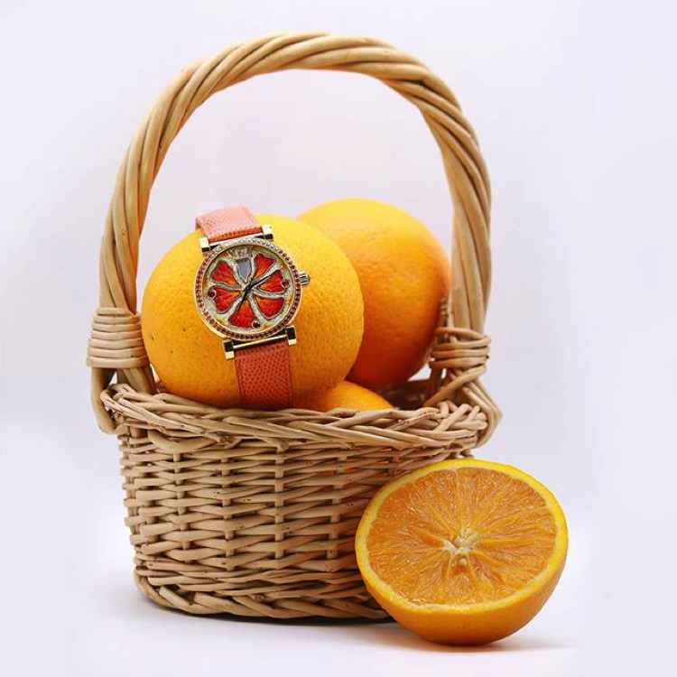 A zesty watch combines vibrant orange stones Designed by Sicis.
