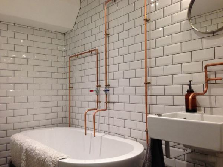 Beautiful exposed copper makes for a beautiful bathroom interiors
