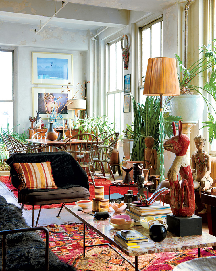 Sunny and colorful maximalist sitting area.