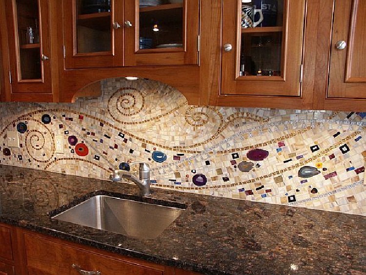 Beautiful swirling kitchen mosaic backsplash.