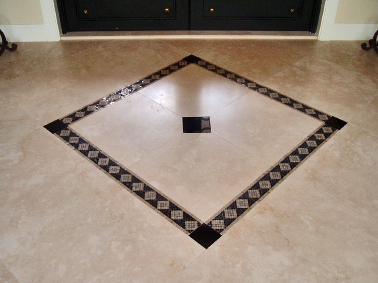 Subtle mosaic floor inlay centerpiece