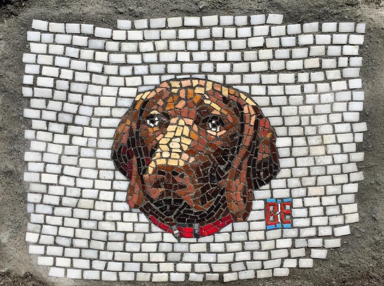 Pothole cover mosaic by Jim Bachor