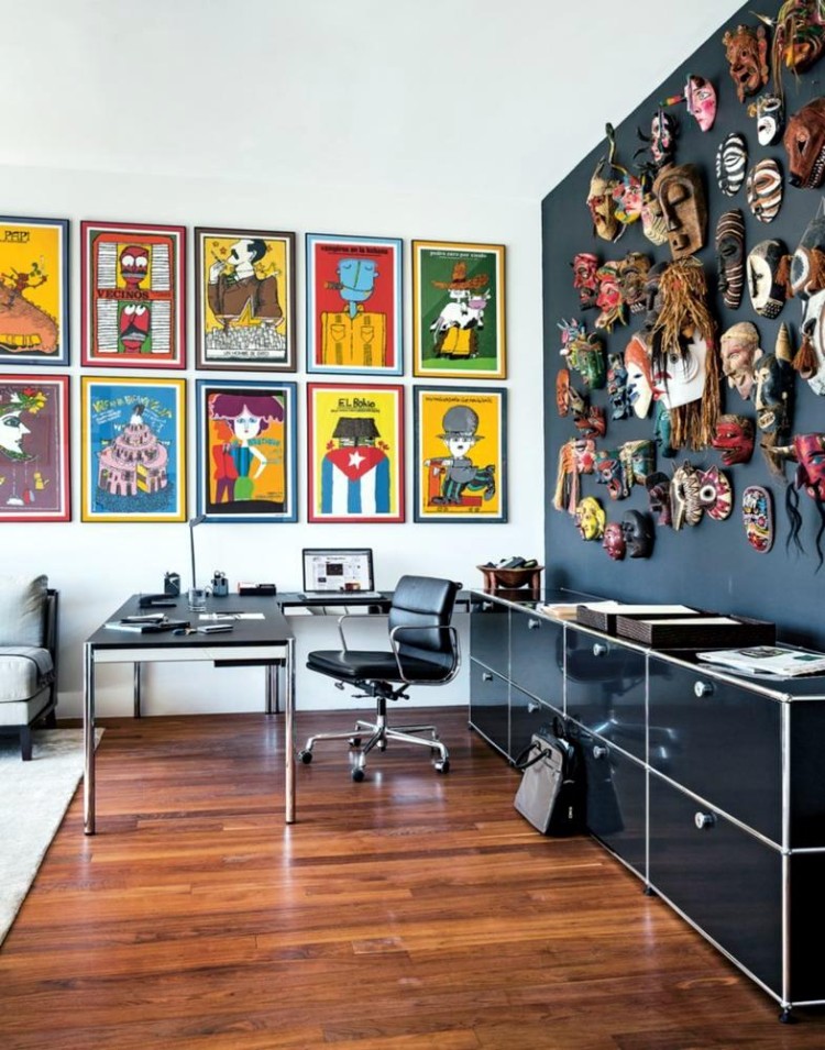 Masks and souvenirs help personalize the office. 