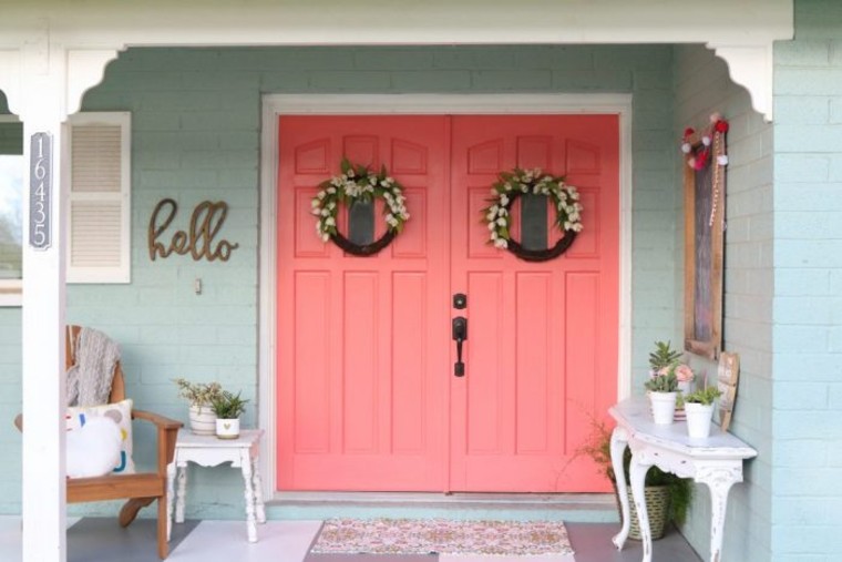 Large scale pink door as a statement piece.