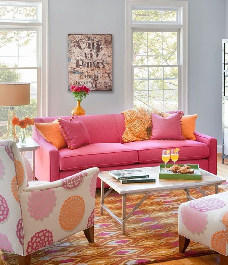 Comfy pink sofa statement piece.