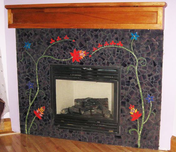 Stunning and simple mosaic artwork for fireplace. 